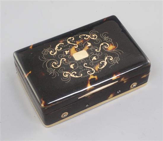 An early 20th century tortoiseshell piqué and gold banded musical box, 3.5in.